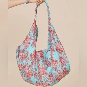 New! Turquoise and Coral printed slouch tote.